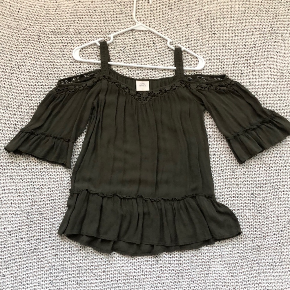 Peep shoulder peplum top